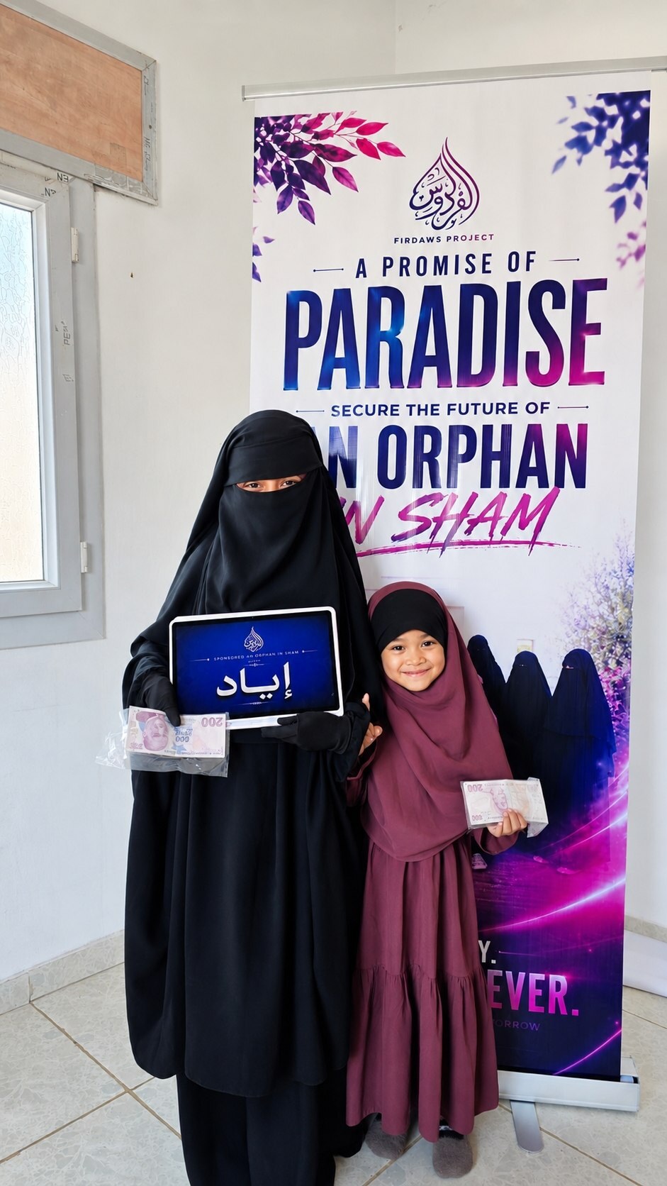 A sponsored child and caregiver receiving support